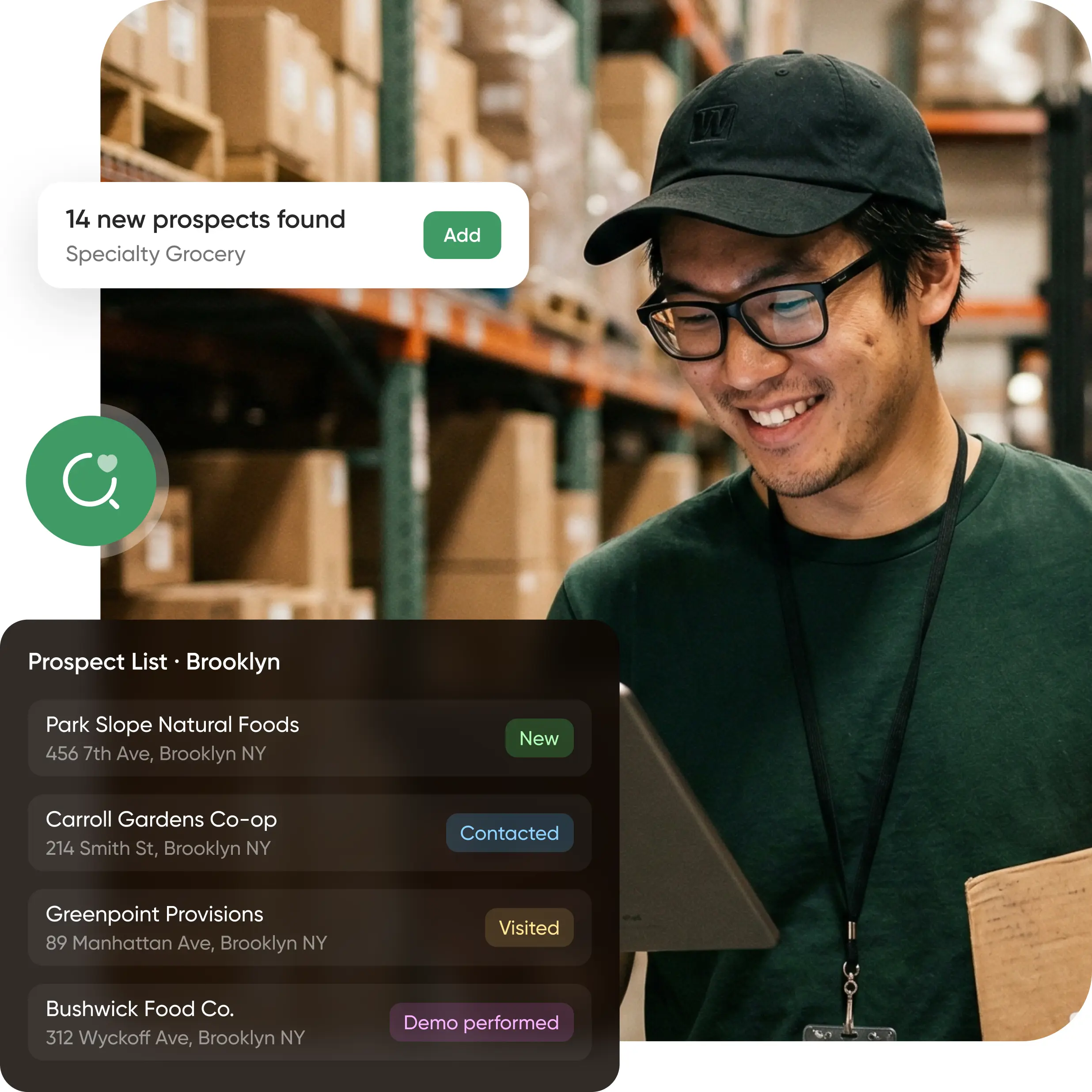 Smiling worker with glasses and cap holds tablet in warehouse, overlay shows Brooklyn grocery prospect list in distribution software.